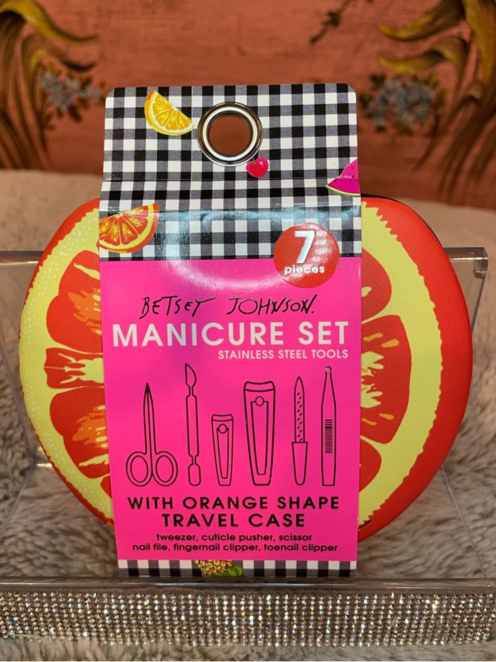 Betsey Johnson 7-piece manicure set in a citrus-shaped travel case
